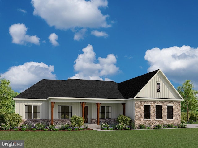 view of front of home with a front yard and a porch