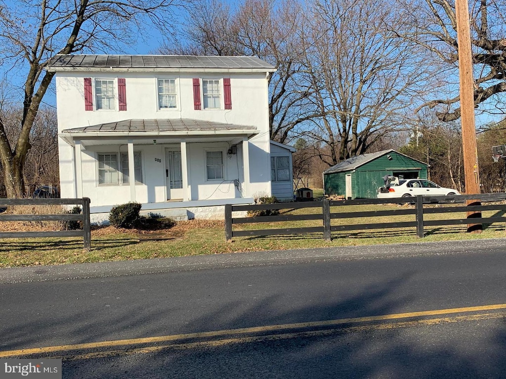 view of front of property featuring covered porch