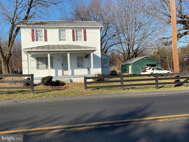 view of front of property featuring covered porch