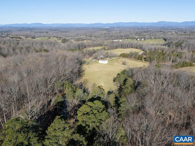 birds eye view of property featuring a mountain view