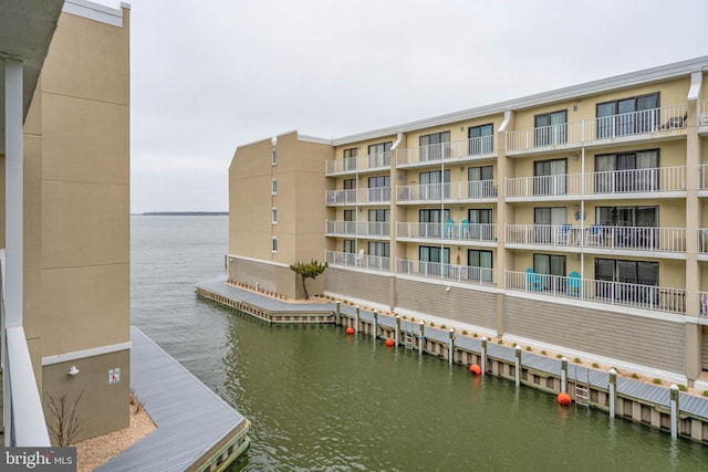 exterior space with a water view