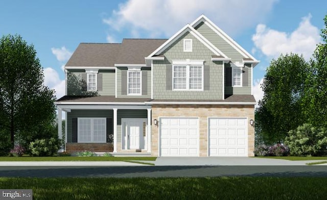 view of front of house featuring a garage and driveway