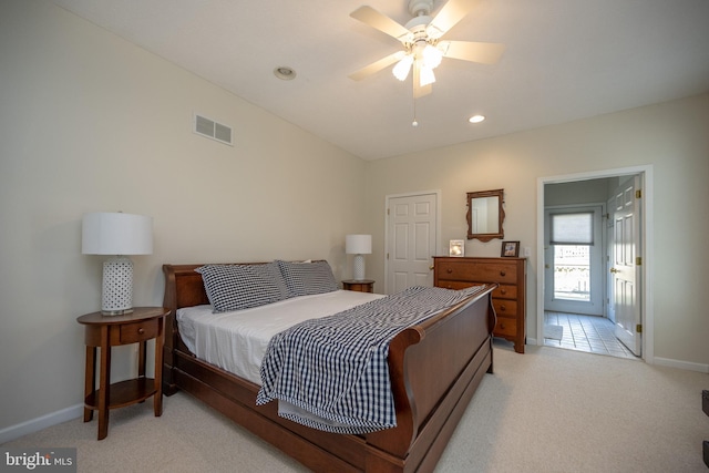 tiled bedroom with ceiling fan