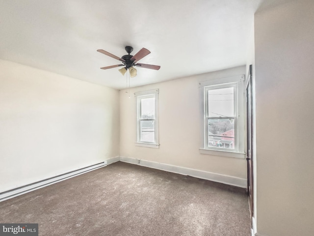 unfurnished room with dark colored carpet, ceiling fan, and a baseboard heating unit