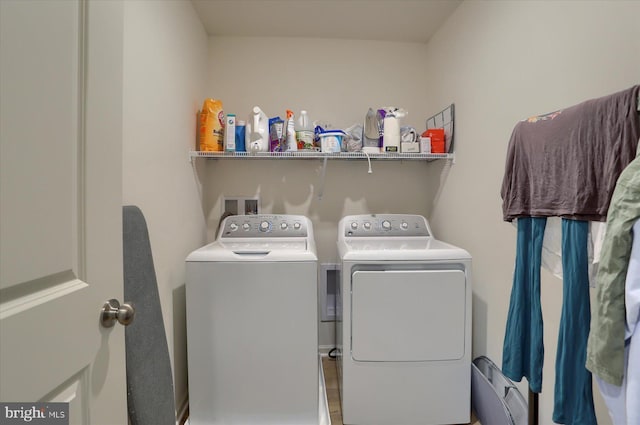 laundry area with washer and dryer