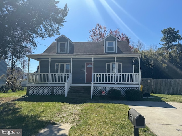 view of front facade with a porch and a front lawn