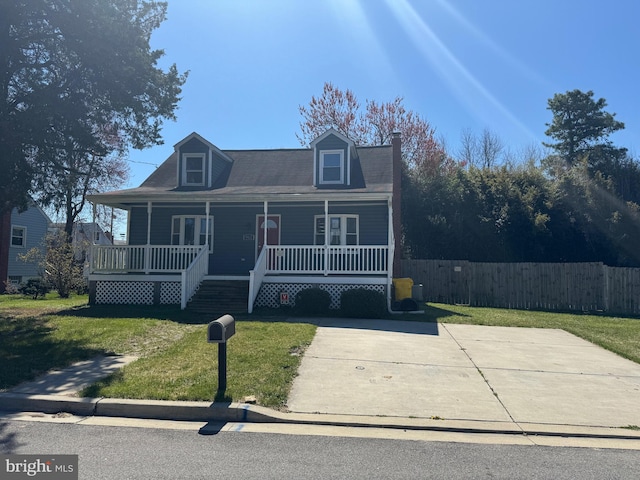 view of front of home featuring a front lawn and a porch