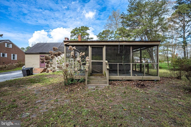 exterior space with a sunroom