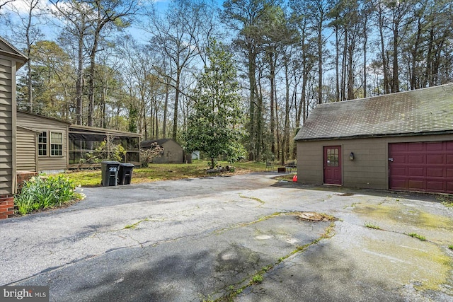 view of home's exterior with a garage