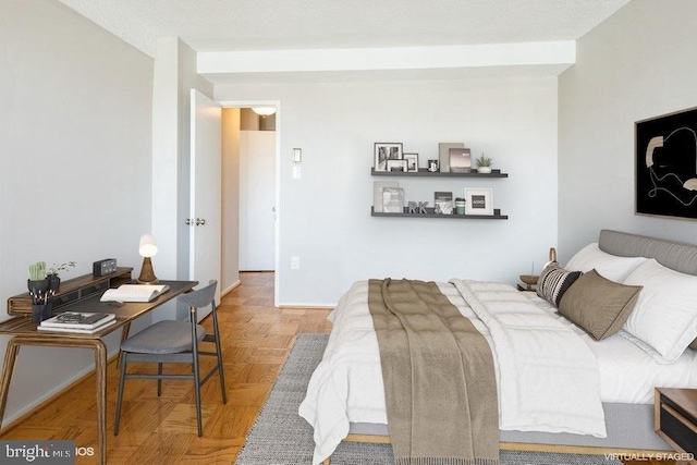 bedroom featuring light parquet floors