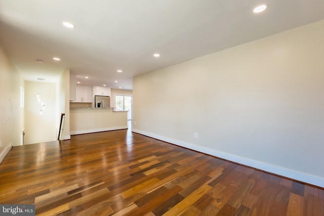 empty room featuring hardwood / wood-style floors