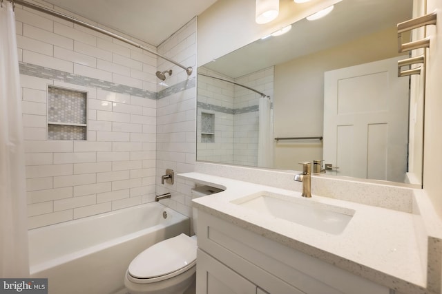 full bathroom with oversized vanity, shower / bath combo, and toilet