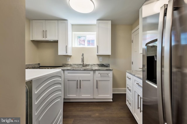 kitchen with stainless steel fridge with ice dispenser, dark wood-type flooring, white cabinets, and sink