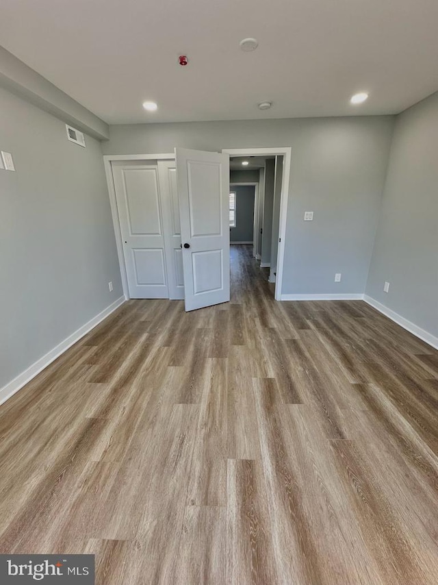 unfurnished bedroom with light hardwood / wood-style flooring