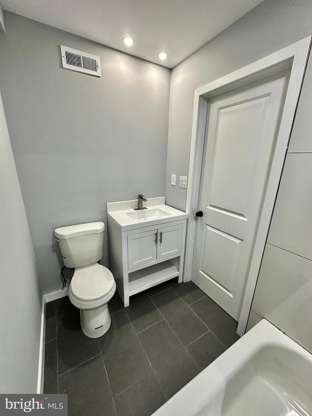 full bathroom with shower / washtub combination, vanity, toilet, and tile flooring