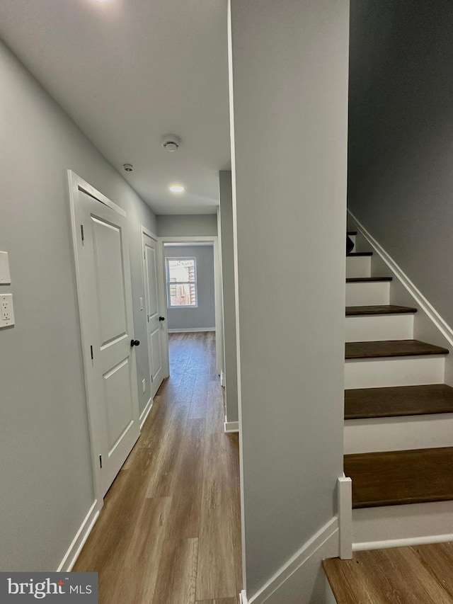 hallway featuring light hardwood / wood-style flooring