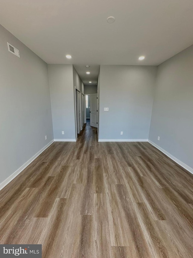 empty room featuring hardwood / wood-style floors