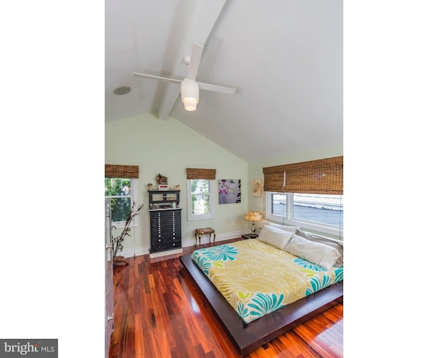 bedroom featuring ceiling fan, vaulted ceiling with beams, and dark hardwood / wood-style floors