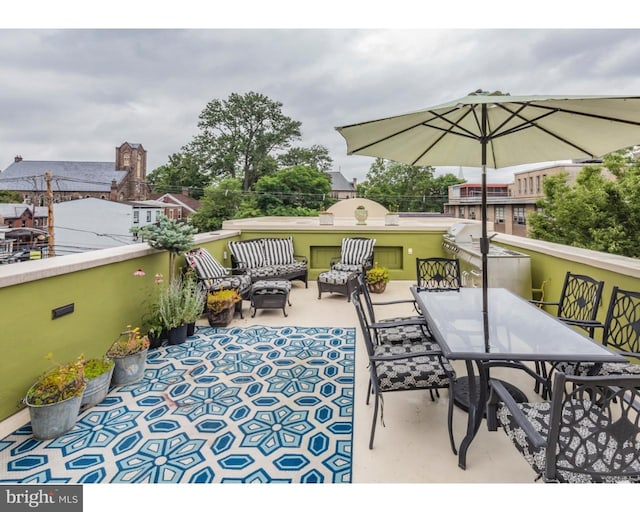 view of terrace featuring a balcony