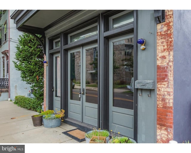 property entrance featuring french doors