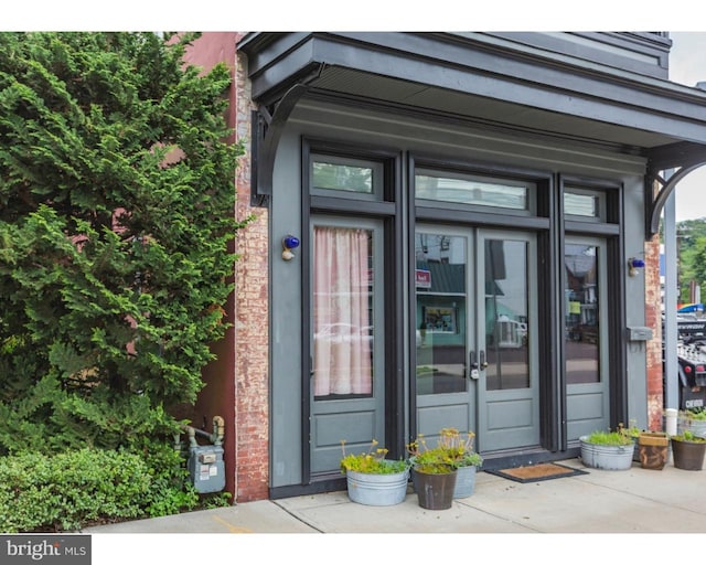 property entrance featuring french doors