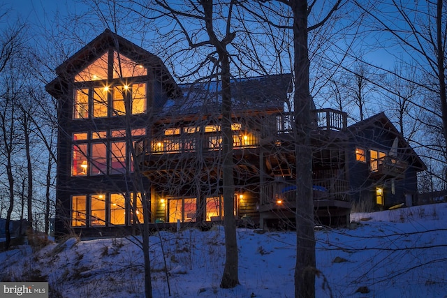 view of snow covered house