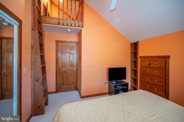 bedroom with light carpet, ceiling fan, and lofted ceiling