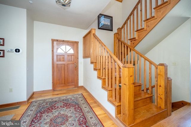 entryway with light hardwood / wood-style flooring