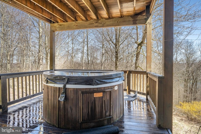 deck with a hot tub