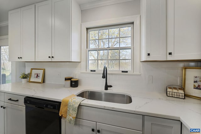 kitchen with white cabinets, dishwasher, tasteful backsplash, and light stone countertops