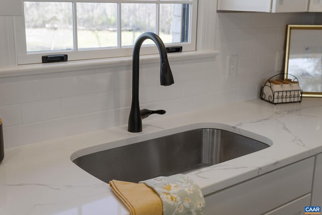 room details with tasteful backsplash and sink