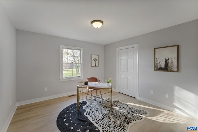 home office featuring light wood-type flooring