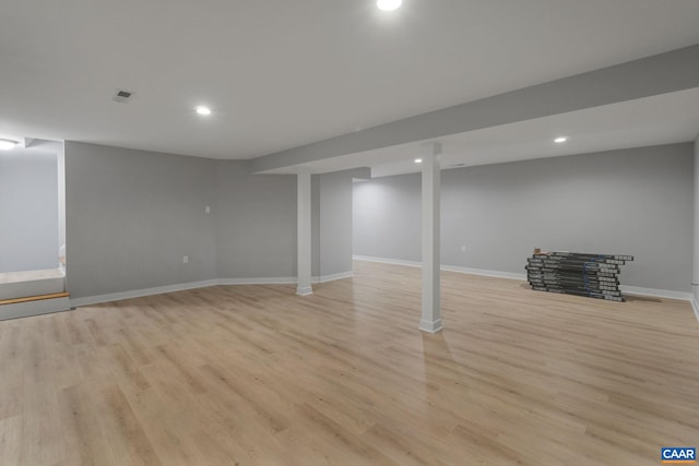 basement with light wood-type flooring