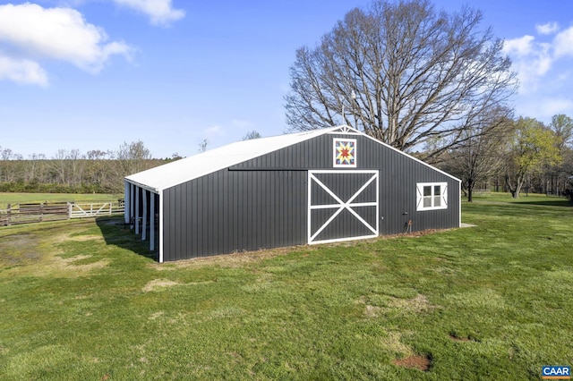 view of outdoor structure with a yard