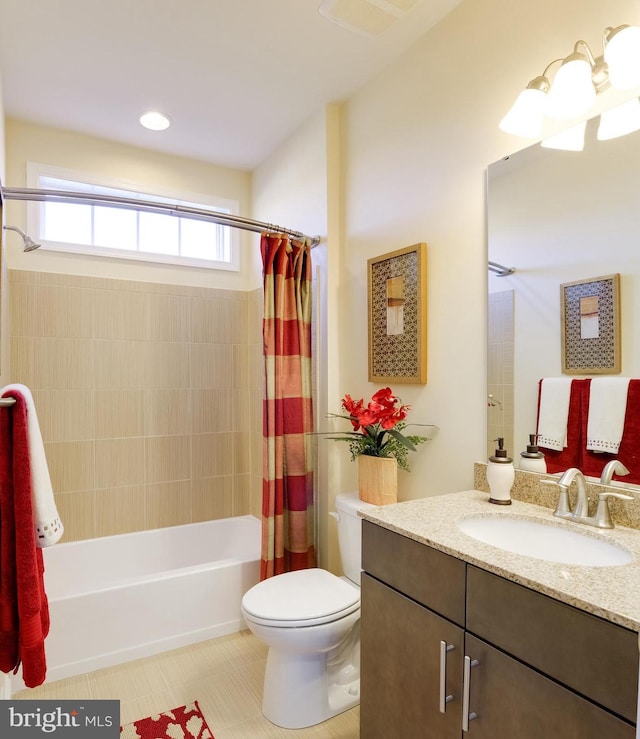 full bathroom with toilet, shower / bath combo, vanity, and tile flooring