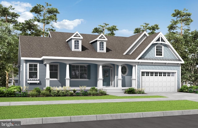 view of front of house with a porch, a front yard, and a garage