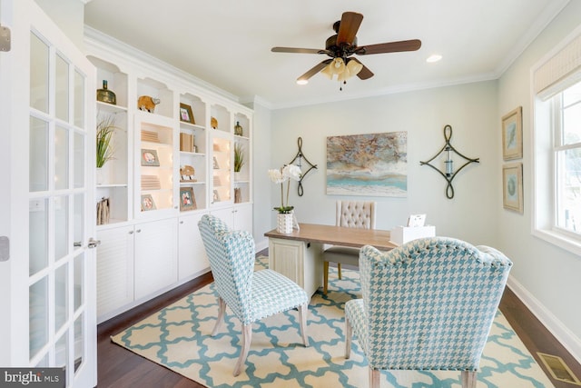 living area with plenty of natural light, ornamental molding, ceiling fan, and dark hardwood / wood-style flooring