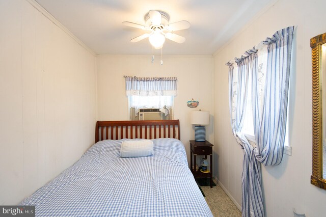 bedroom featuring ceiling fan and light carpet