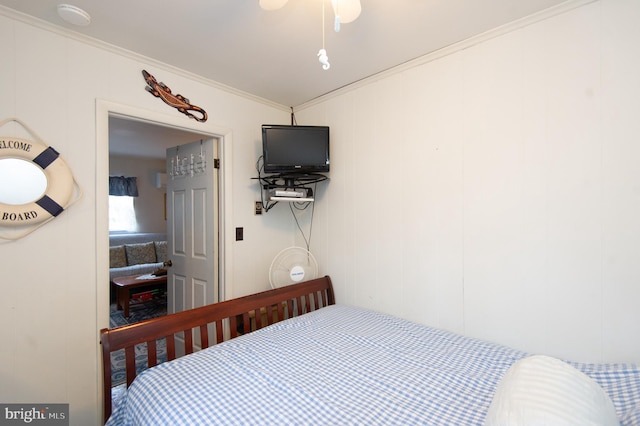 bedroom with ornamental molding