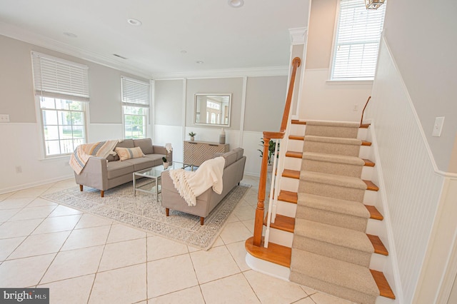 tiled living room featuring ornamental molding