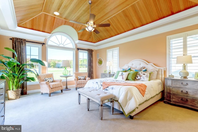 carpeted bedroom with ornamental molding, ceiling fan, wooden ceiling, and multiple windows