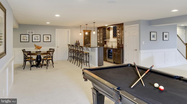 recreation room with light colored carpet, beverage cooler, billiards, and sink