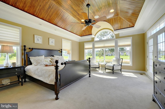 carpeted bedroom featuring crown molding, wooden ceiling, and multiple windows