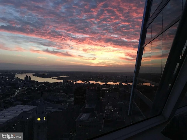 property's view of city featuring a water view