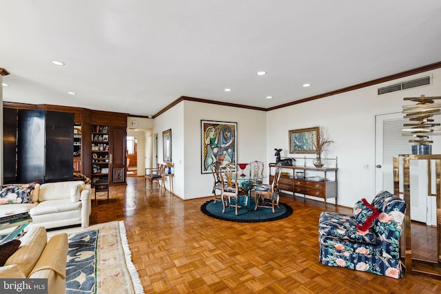 living room with crown molding and light parquet flooring