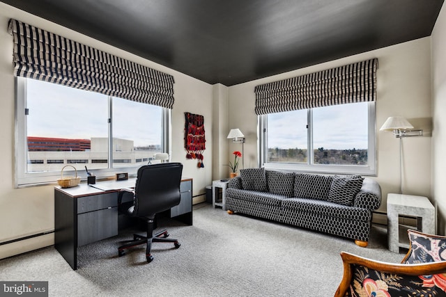 carpeted home office featuring a baseboard heating unit