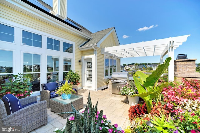 view of patio / terrace with area for grilling, a pergola, and outdoor lounge area