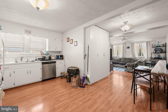 kitchen with ceiling fan, dishwasher, white cabinets, and light wood-type flooring