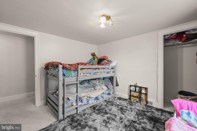 bedroom with light colored carpet