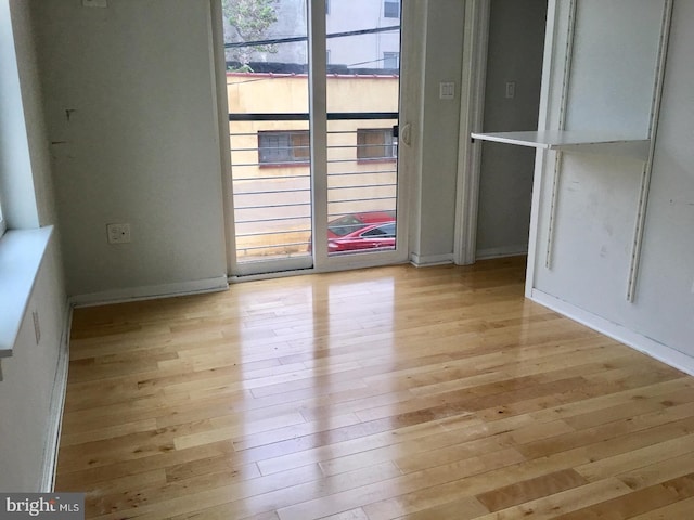 unfurnished dining area featuring light hardwood / wood-style floors